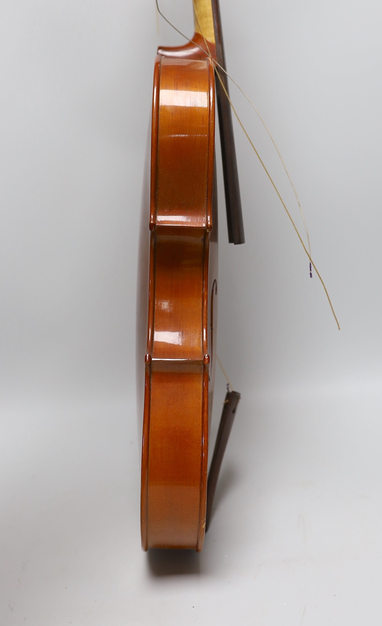 A cased viola and bow, viola back measures, 40.5cm